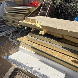 Mold and bug infested materials that sat in backyard for years that Carlos is planning on reusing