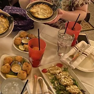 Granny Smith apple, lettuce salad.  Crawfish Mac n cheese, crab beignets, fried green tomatoes, frozen pomegranate mojitos.