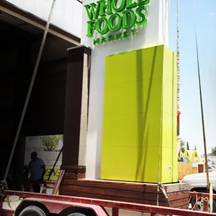 Whole Foods Market Monument sign with front reverse lit channel letters.