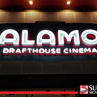 Alamo Drafthouse Cinema, exterior sign. Neon front lit and Red halo back lit channel letters. Install.
