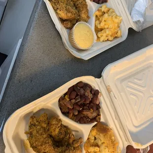 two trays of food on a table