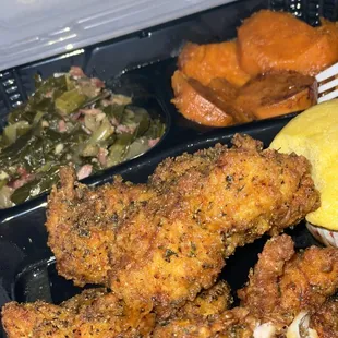 Lemon Pepper Tenders, Candied Yams, Collard Greens, and Cornbread Muffin