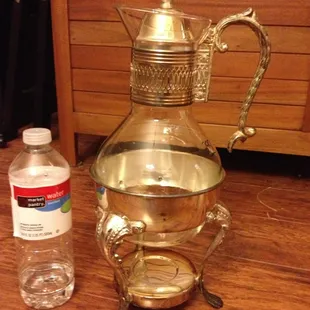 This awesome...thing was only $3.99. Seems to be silver plated because it's a bit tarnished. (Water bottle for size reference.)
