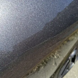 The spot where someone had keyed my car. You can barely see it now.