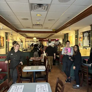a group of people in a restaurant