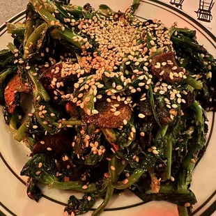 Pea shoots with spicy mushrooms