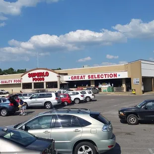 a lot of cars parked in a parking lot