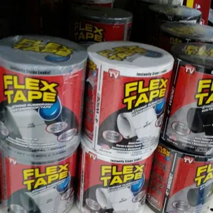 a variety of tape on a shelf