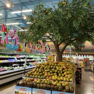 a fruit stand in a grocery store