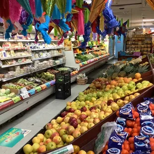 This is our farm fresh Dairy and produce aisle.
You can see our famous piñatas overhead!