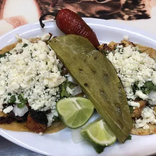 Taco Al Pastor and Taco Pollo with cheese