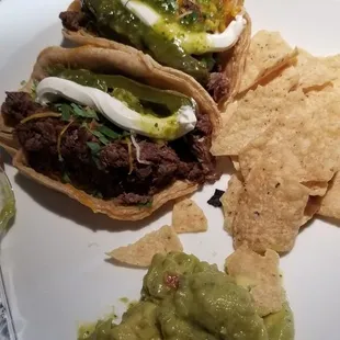 Steak, I added cheese, cilantro, peppers, sour cream, green salsa