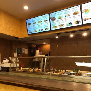 a view of a restaurant counter