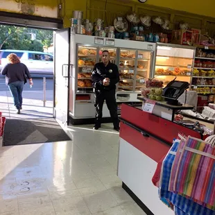 This security guard followed my partner around the store and was monitoring the way he picked out produce.