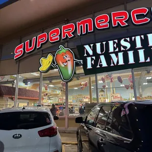 cars parked in front of the store