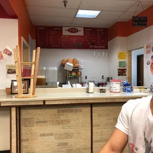 a man sitting at a counter