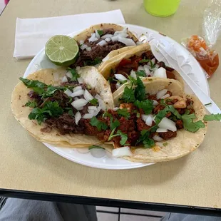 a plate of tacos on a table