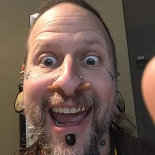 Haha he was taking our picture for us and said he needed to do a selfie lol!!