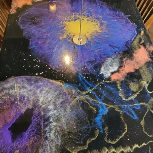 a table with chalk drawings on it