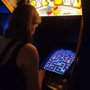 a woman playing a video game
