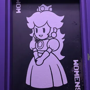a purple door with a princess on it
