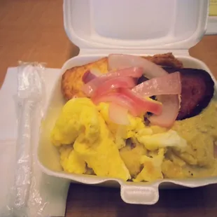Breakfast of champions: Mangu con salami, scrambled eggs, fried cheese and onions on top.