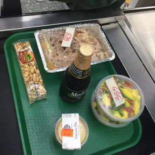 Roast pork, avocado salad, flan, beer and a nut bar!