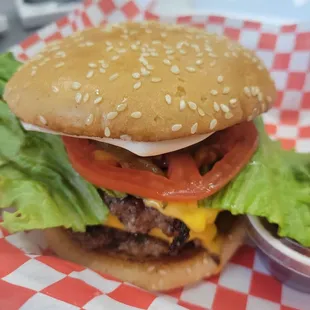 The delicious and juicy Signature Bauce Burger. All plates come with fries and a drink or you can sub the fries for swamp rice.