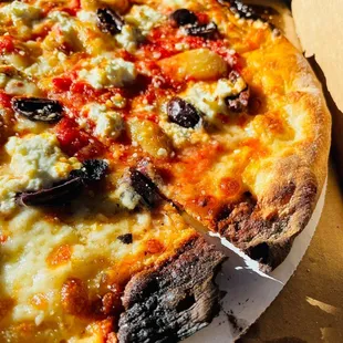 Supino Pizzeria Signature Pizza w/ Roasted Garlic, Black Olives, Chili Oil, and Ricotta Cheese