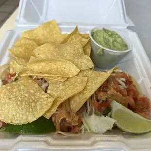 Fish tacos, chips, guacamole