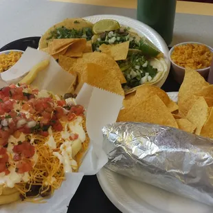Carne asada fries, 619 burrito and the suplex tacos