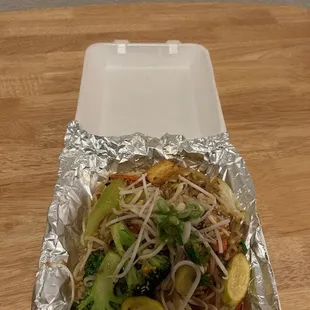 Pad Thai with Tofu, around $16.00. Lots of fresh veggies cooked perfectly . Kudos to the chef.