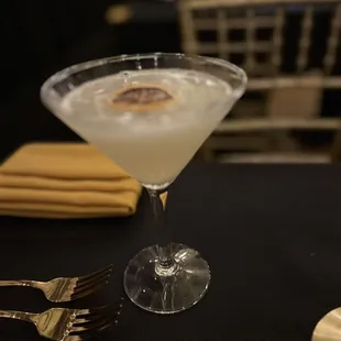 a cocktail in a martini glass