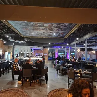 a woman sitting in a restaurant