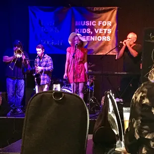 a band performing on stage