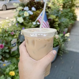 a person holding a cup