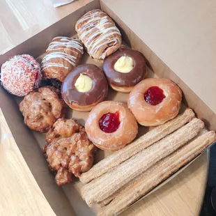 a variety of donuts in a box