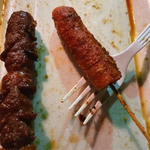 A sausage is cut in half, and something is missing