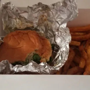 Sorry, I started eating and almost forgot the picture lol. But this is the Jamaican jerk burger with seasoned fries. So good!