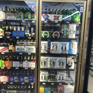 a display case of beer in a store