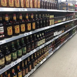 a wide selection of alcohol in a grocery store
