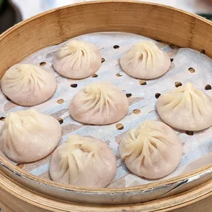 Supreme Pork Xiao Long Bao. Very tender skins, but won&apos;t rip as easily as other places. Come with 8 pieces. Lots of soup inside. Very tasty!