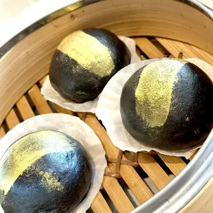 Charcoal gold lava custard bun w/ gold flakes - very good!