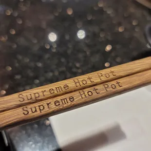two chopsticks on a plate