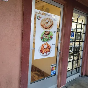 the front door of a restaurant