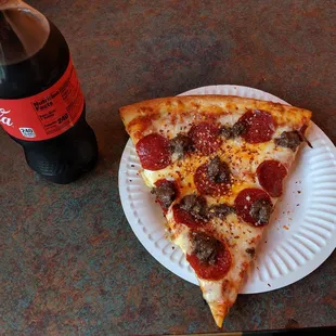 Their special: 1 slice of any pizza and a 20 oz soda for $6.25. Awesome deal!