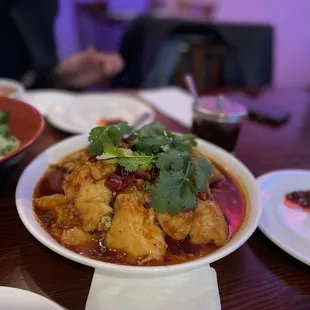 Sliced fish in hot chili oil