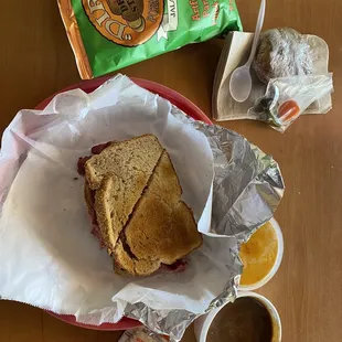 Ruben sandwich, jalapeño chips, chili and cookies.