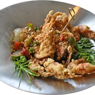 Soft shell crab prik glur

Crispy, tender, and full of flavor! Dive into our special soft shell crab dish today at Supreme Thai Bistro.