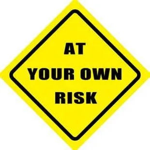 at your own risk sign